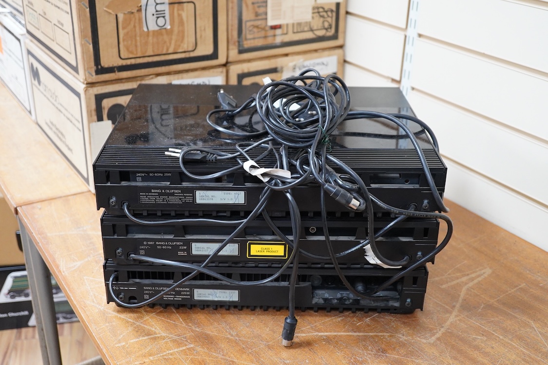 A Bang and Olufsen 6500 hi-fi system, comprising of a Beocord 6500, a Beogram CD 6500, a Beomaster 6500, and a master control panel, together with a pair of floor standing pedestal speakers, 164cm high, and pair of type